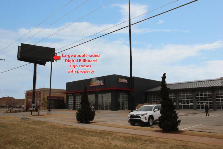 Former Gold Key Service Center | For Sale exterior with sign
