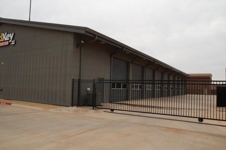 Former Gold Key Service Center | For Sale exterior fenced in