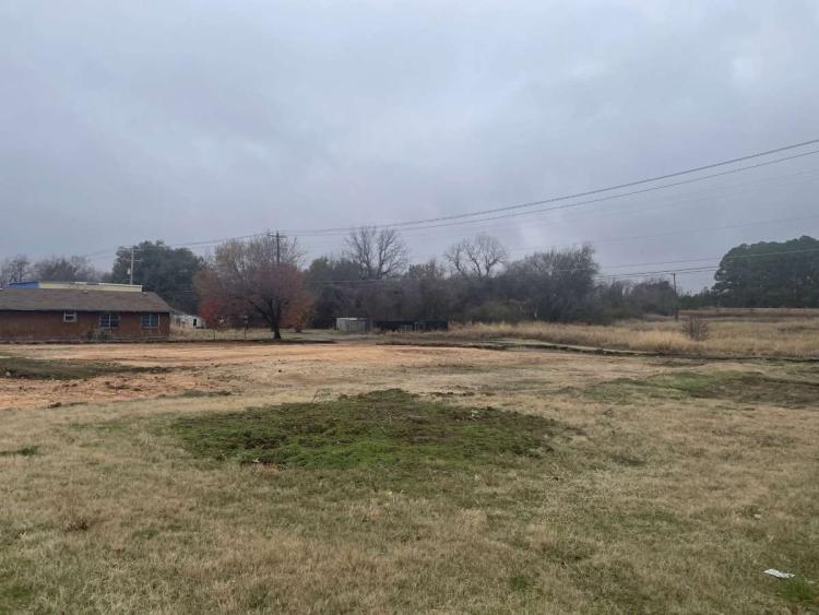 Former Sonic freestanding retail Land For Sale Muskogee, OK photo of lot after torn down building