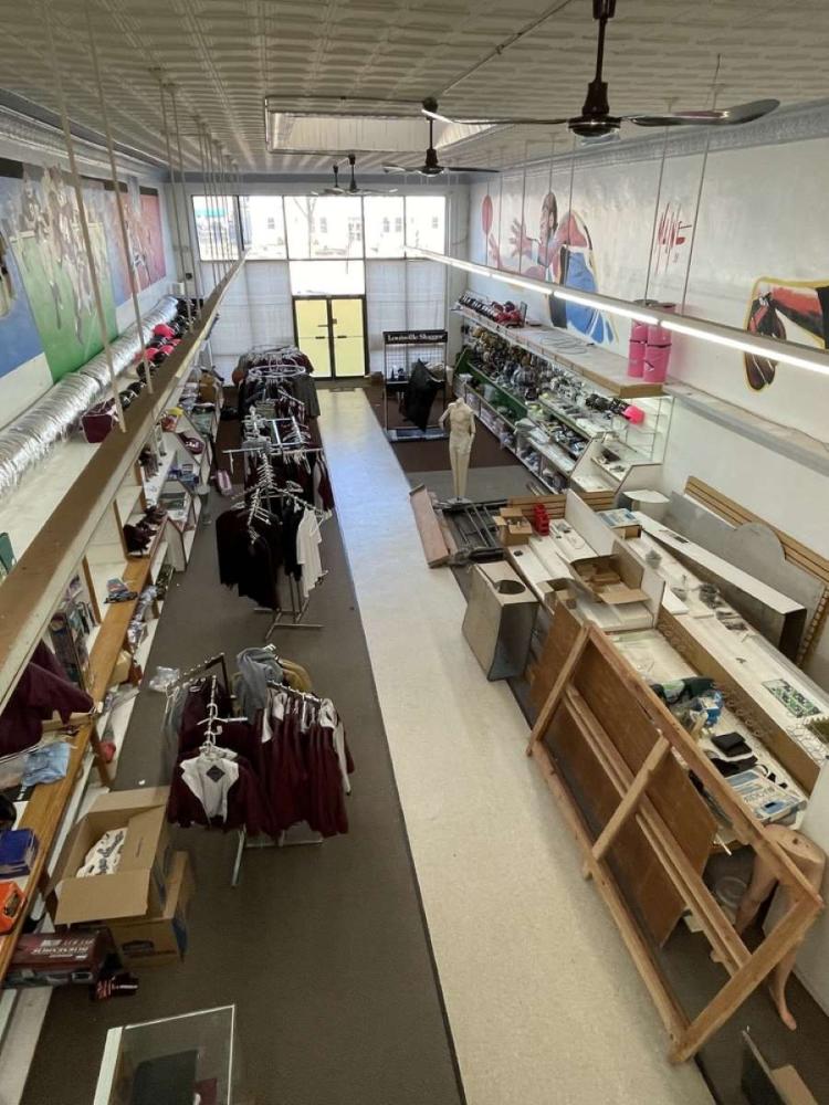retail building for sale in Perry, OK - interior photo from upstairs looking down
